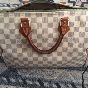 Fair Condition needs cleaning and restoration. Beautiful Bag by LV Authentic.